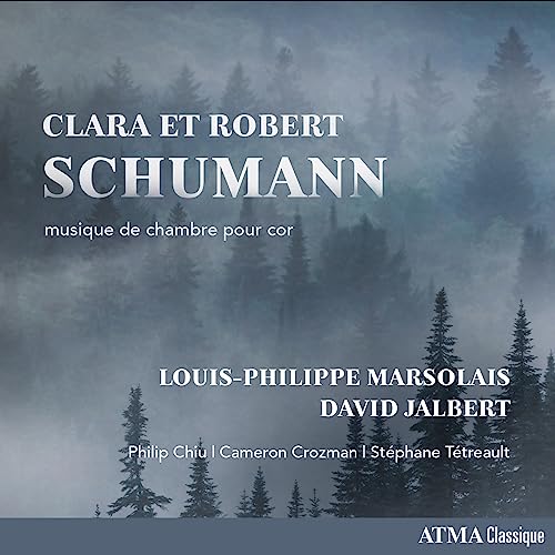 CD cover with misty forest scene and composers’ names in white text.