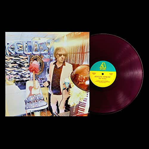 Vinyl record and album cover featuring Kelley Stoltz in a suit.