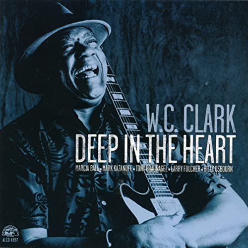 W.C. Clark album cover, smiling man with guitar, blue and white text.