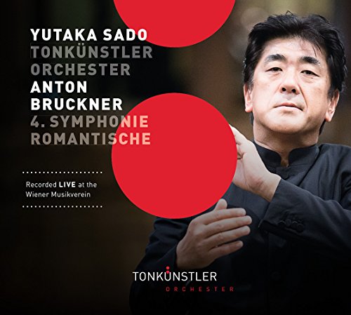 Conductor Yutaka Sado in a black suit with red circles and text overlay.