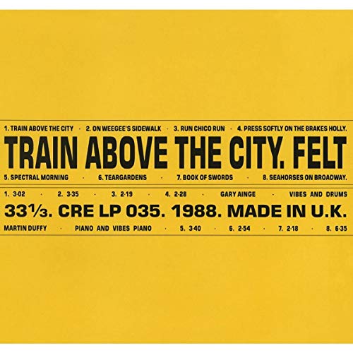 Yellow vinyl record sleeve with black text listing song titles and artist information.