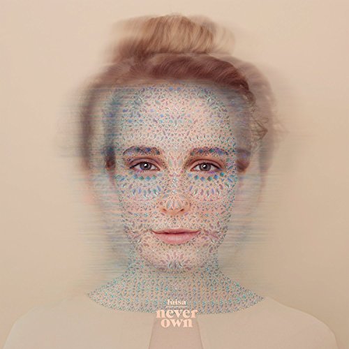 A woman's portrait with a blurred, pixelated effect and text "luisa never own" below.