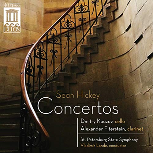 "CD cover featuring a spiral staircase with concert information and logo."