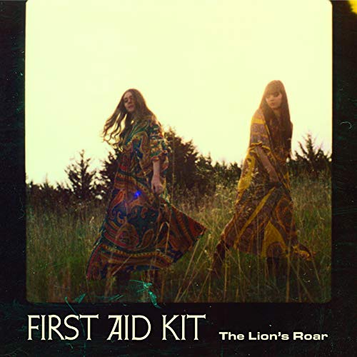 Album cover for First Aid Kit’s “The Lion’s Roar” featuring two women in a field.