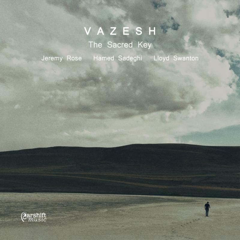 CD cover: cloudy sky over a landscape with a lone figure.