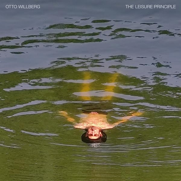 Album cover: person swimming underwater with distorted light reflections.