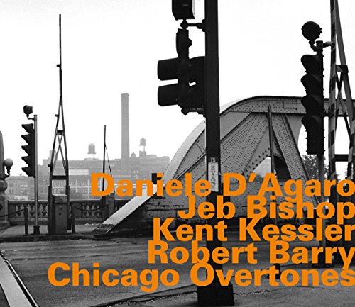 "Album cover with orange text on a black and white cityscape background."