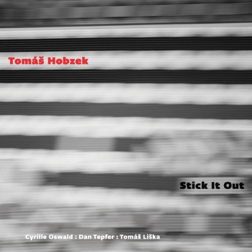 "Blurry black and white album cover with red and black text."