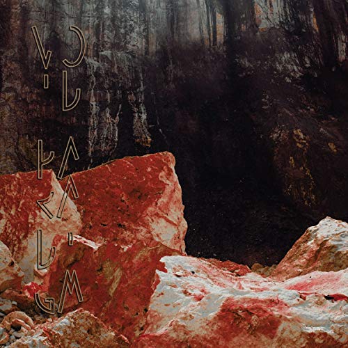 Dark forest scene with red rock and stylized, vertical text.