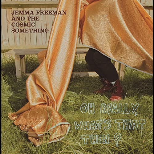 Album cover for Jemma Freeman & The Cosmic Som, featuring a person in gold fabric.