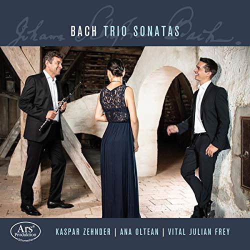 CD cover featuring three musicians in formal attire standing in an arched stone hallway.