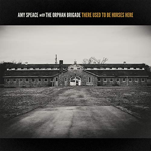 Album cover: black-and-white image of an abandoned stone building with text above.