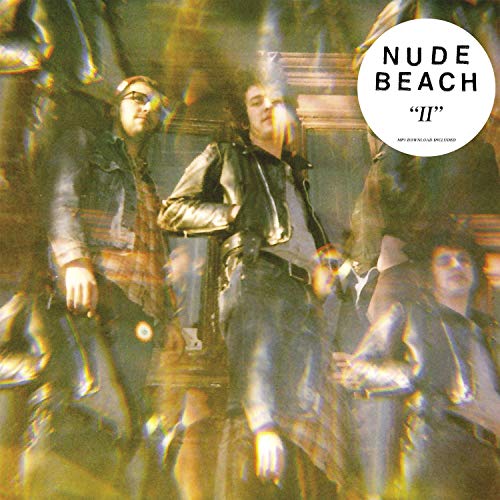 Blurry image of multiple men in leather jackets, multiple exposures visible.