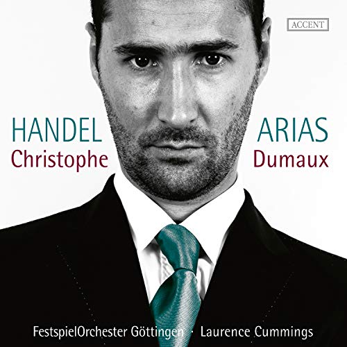Black and white photo of man in suit on album cover.