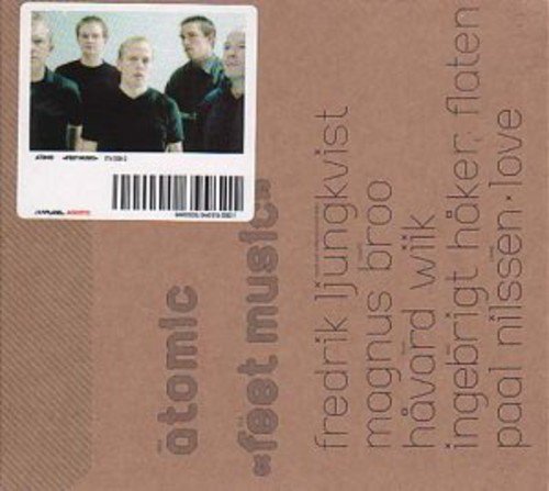 "Brown album cover with a band photo and barcode in the top left corner."