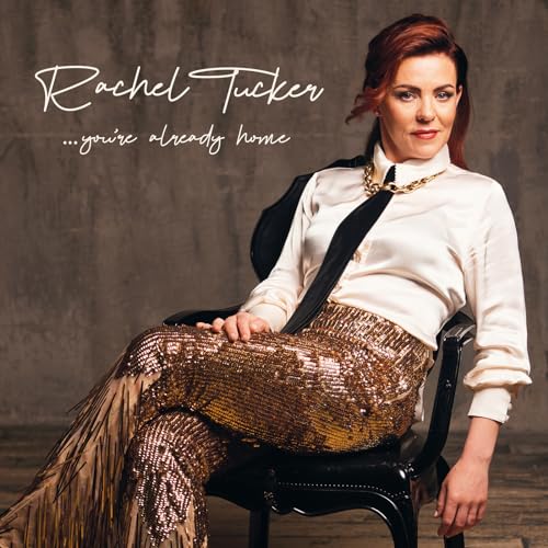Rachel Tucker album cover: woman in gold pants seated in a chair.