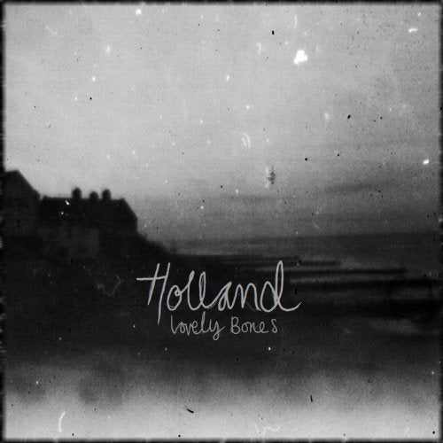 "Holland - Lovely Bones" vinyl album cover with a black-and-white seascape image.