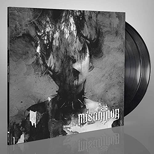 Black and white vinyl record with abstract, distressed face album art.