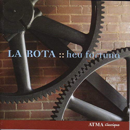 CD cover with large, dark metal gears against a brick wall.