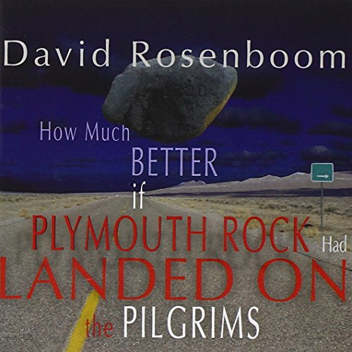 "Album cover with a boulder on a road and text overlay."