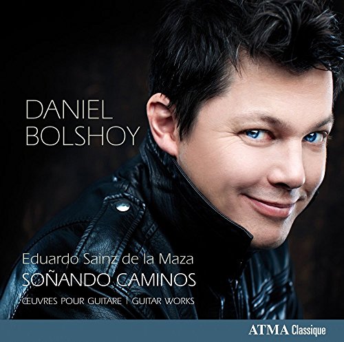 CD cover featuring a man with blue eyes and dark hair, wearing a black leather jacket.