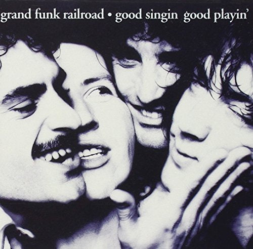 Black and white album cover featuring three smiling men, Grand Funk Railroad.