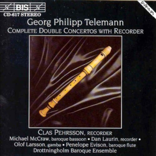 CD cover with a golden recorder on a black satin background.