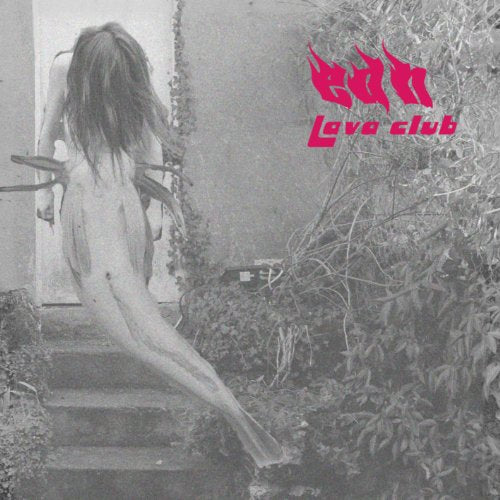 Black and white photo of a person descending stairs, pink text “Edh - Lava Club”.