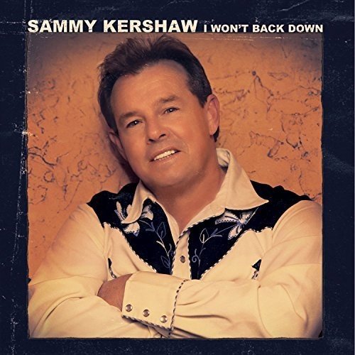 "CD cover with Sammy Kershaw's portrait, wearing a white shirt and black vest."