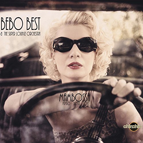 CD cover: blonde woman in sunglasses driving a vintage car.