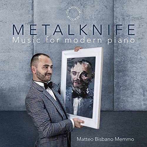 Man holding a framed portrait, album cover for Matteo Bisbano Memmo.