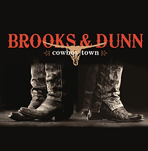 Brooks & Dunn "Cowboy Town" CD cover with cowboy boots and a bull skull.