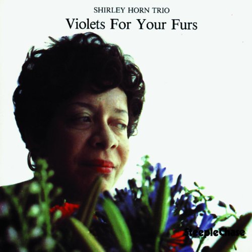 CD cover featuring Shirley Horn with blue and red flowers.