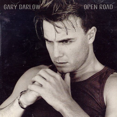 Black and white CD cover of Gary Barlow, looking downwards.