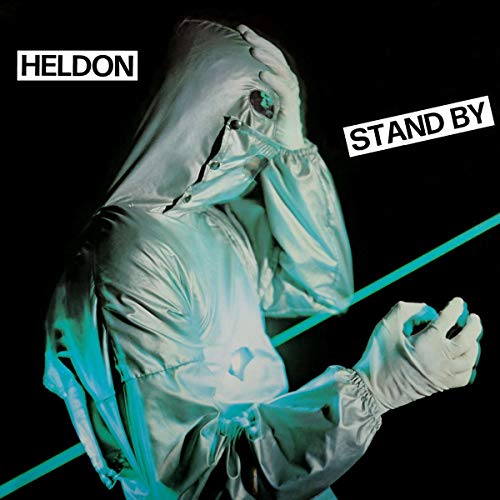 Album cover: person in silver suit with face obscured, blue accents.
