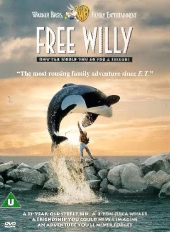 Free Willy" DVD cover: orca breaching water near a boy.