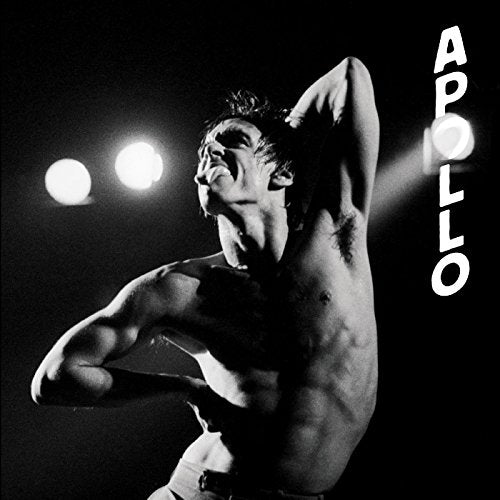 Black and white photo of Iggy Pop performing shirtless on stage with Apollo text.
