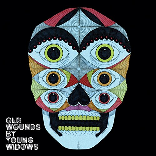 CD cover: colorful, symmetrical skull illustration with multiple eyes.