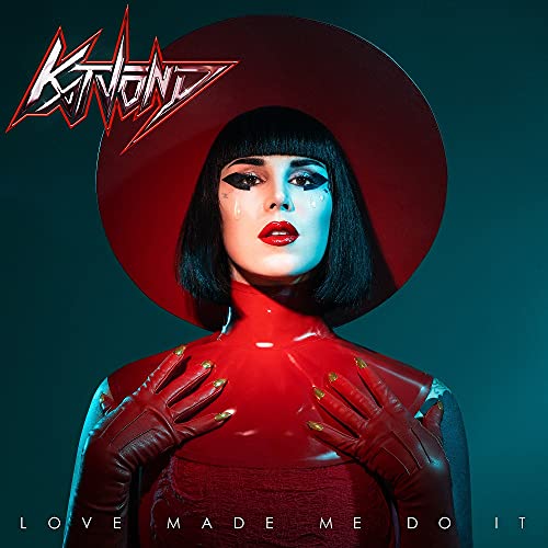 Kat Von D album cover: woman in red outfit and large hat.