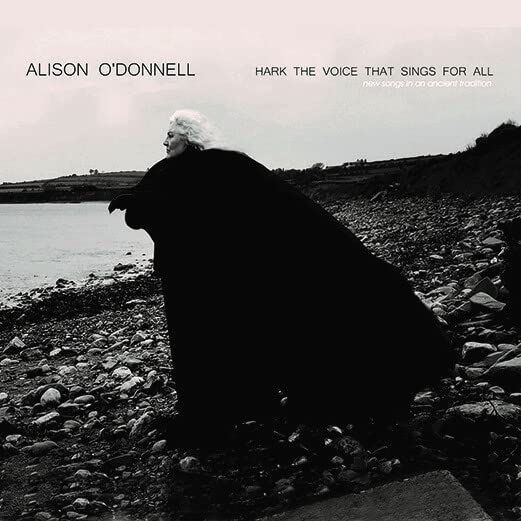 Alison O’Donnell CD cover: woman in dark cloak by a rocky shore.