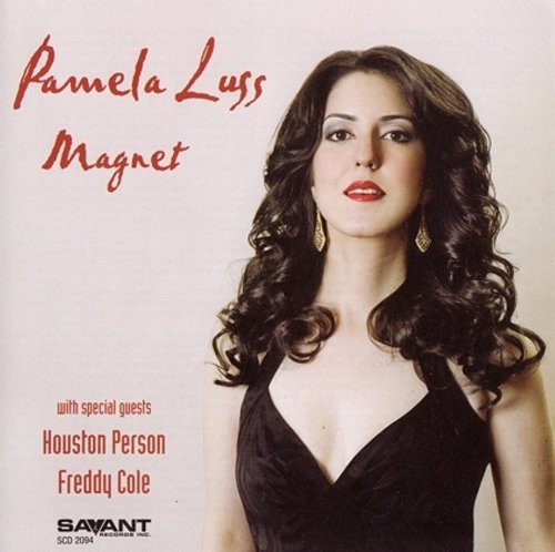 CD album cover featuring a woman in a black dress.