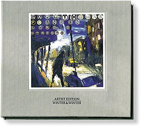 A CD box set with a painting of a city street scene.