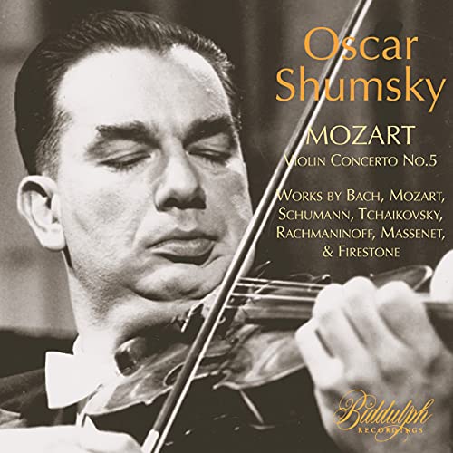 Black and white portrait of violinist Oscar Shumsky playing violin.