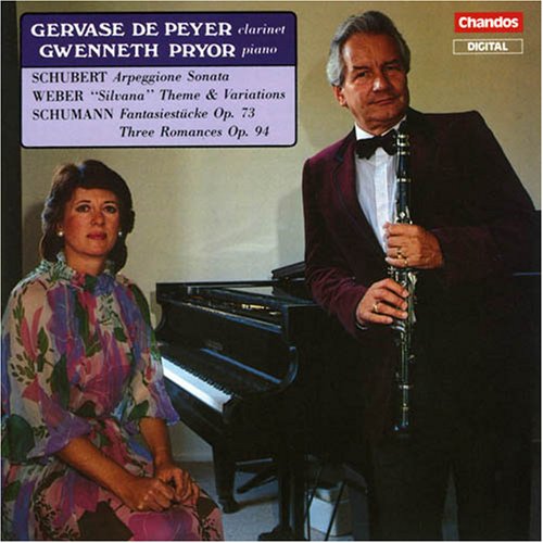 "CD cover featuring a man with clarinet and a woman beside a piano."