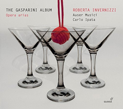 CD cover featuring five martini glasses with a red ball in the center glass.