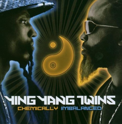 "Album cover featuring two men's profiles with a yin-yang symbol between them."