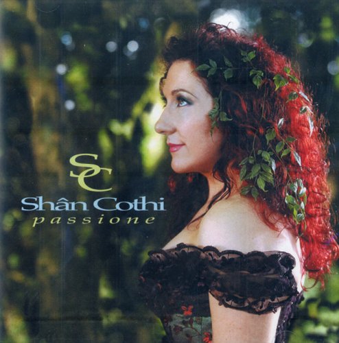 CD cover featuring a woman with red curly hair adorned with green leaves.