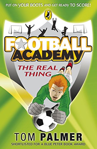 "Book cover featuring a cartoon boy kicking a soccer ball, with a silver shield background."