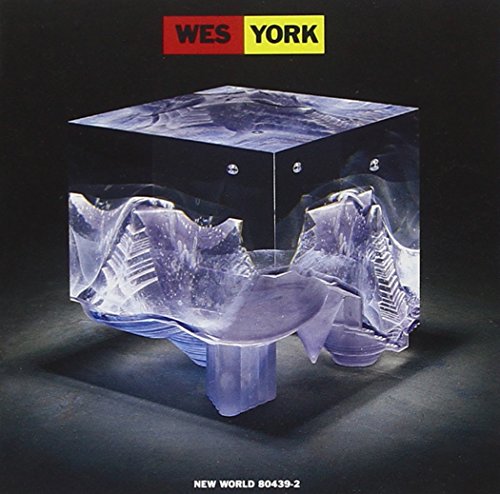 A CD case with a broken glass sculpture on a black background, displaying "WES YORK" logo.