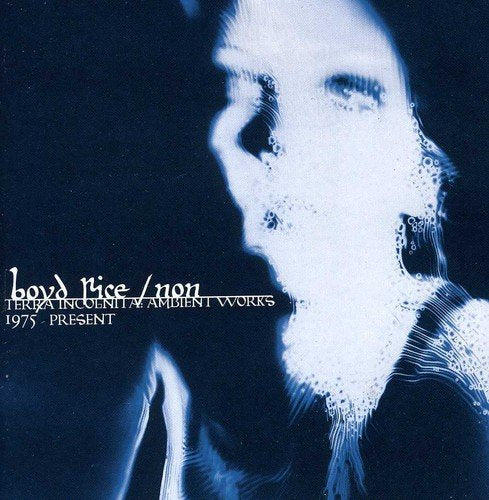 CD cover with a blurred, ghostly face and circuit board patterns.
